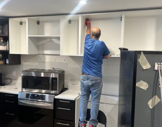 Handyman cabinet installation project